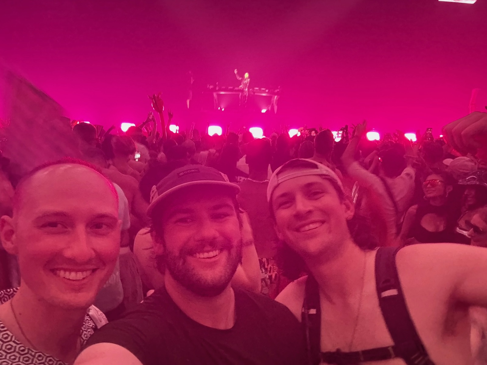 The crew in the pink glow of the DJ set, Tomorrowland 2025